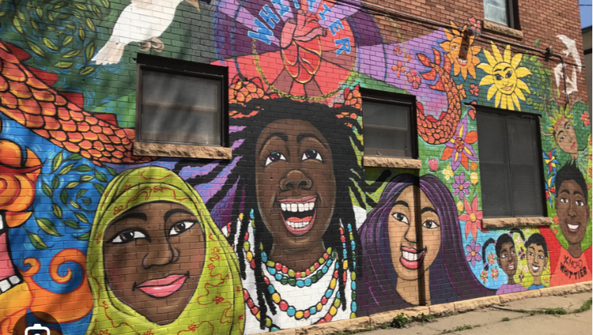 colorful mural on building in a south minneapolis neighborhood